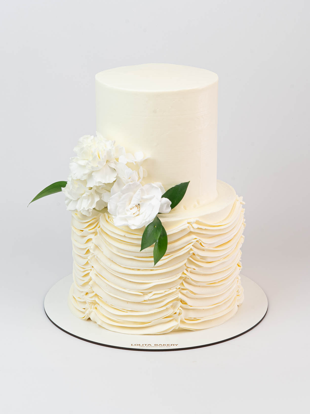 Wedding Cake with Ruffles and Fresh Flowers