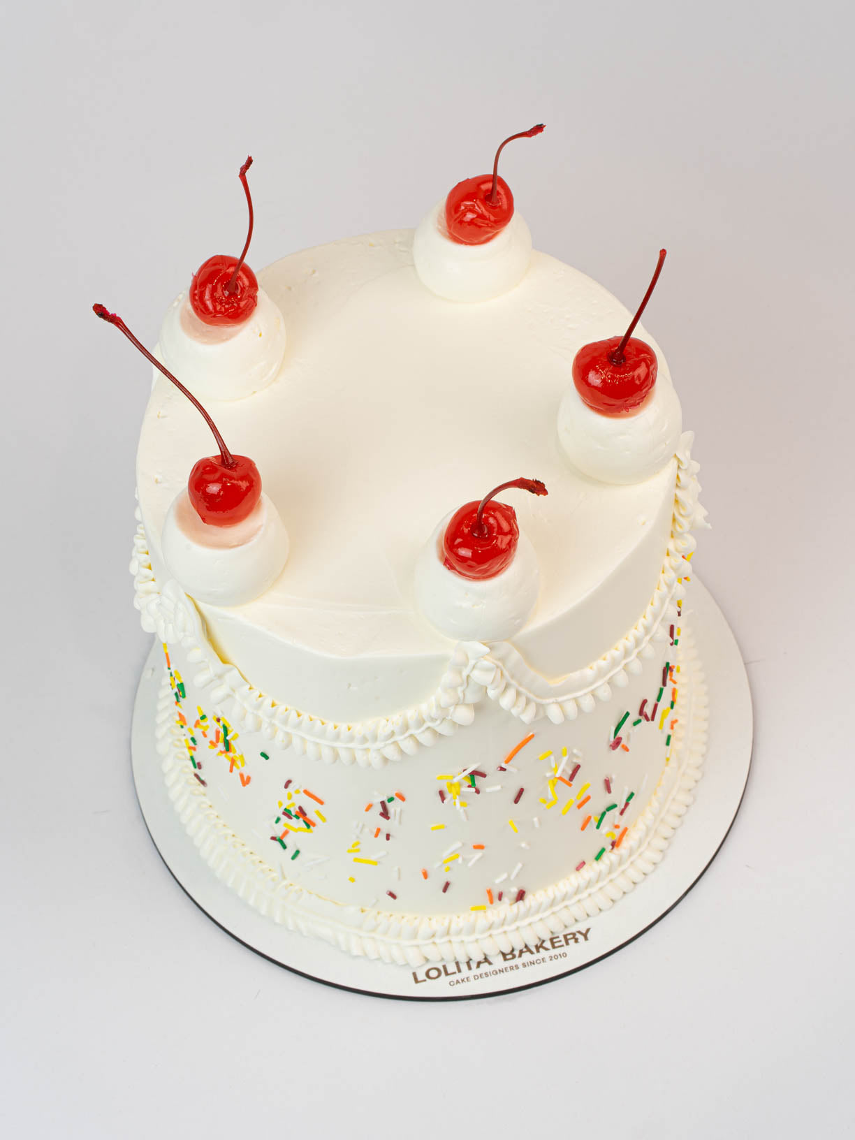 VINTAGE COQUETTE CAKE – BLACK BOWS